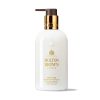 Molton Brown - Mesmerising Oudh Accord & Gold Hand Lotion 300ml Molton Brown - Mesmerising Oudh Accord & Gold Hand Lotion 300ml